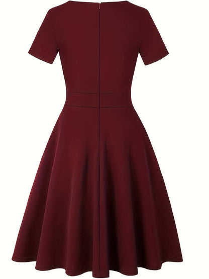 Chic Blue Dress Featuring Lace Accents and a Tailored Waist