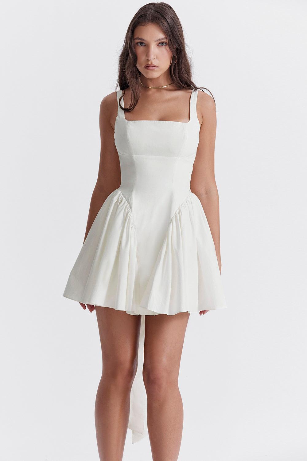 Radiant Elegance: The White Bow Dress